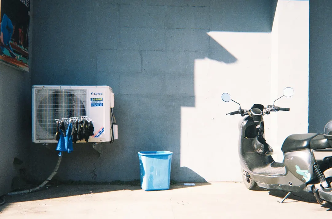 AC tune-up service on residential outdoor unit in Austin