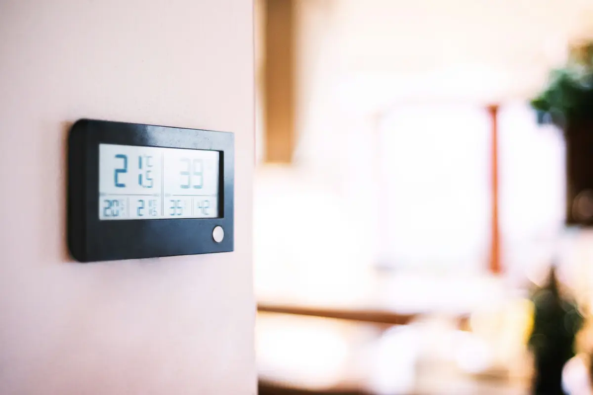 Modern smart thermostat on a residential wall in Austin