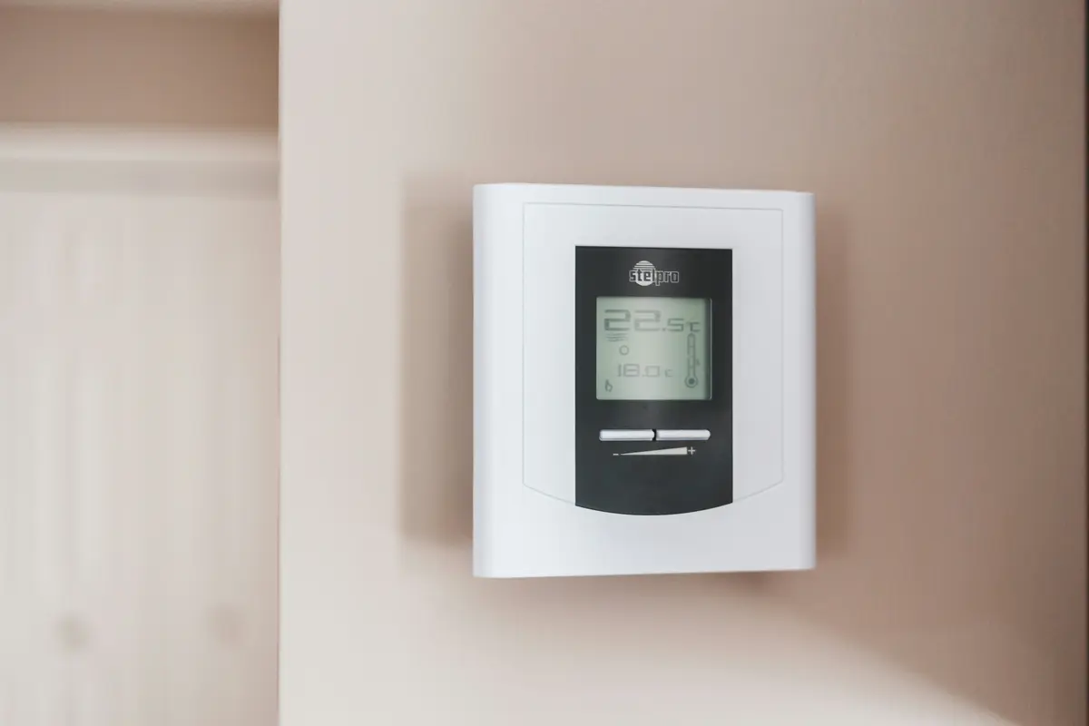 Smart thermostat installed on wall in a Austin home